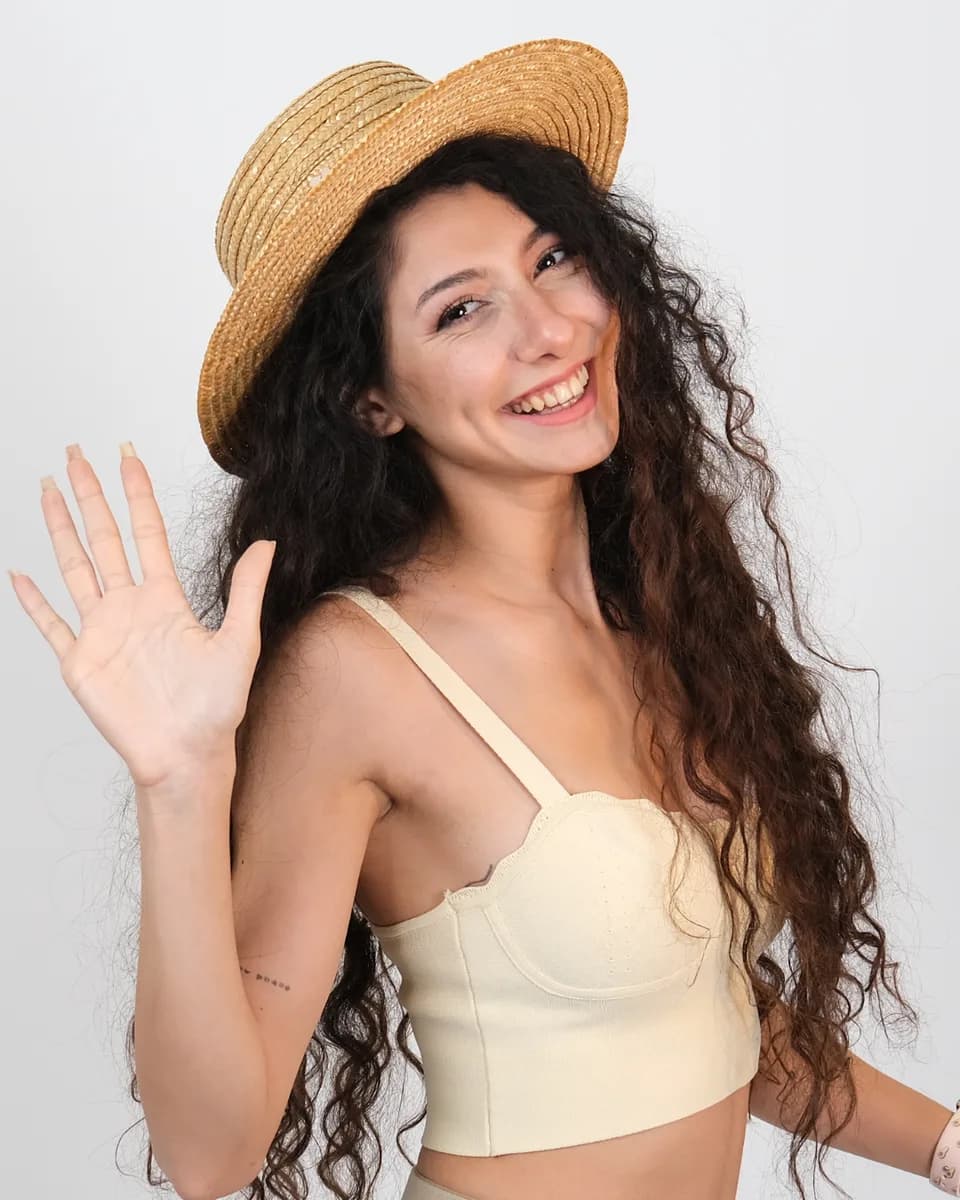 Çilem Akar waving